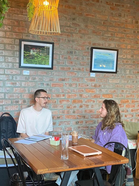 An isiXhosa lesson around a table